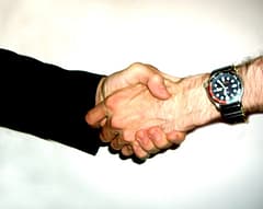 2 man shaking hands